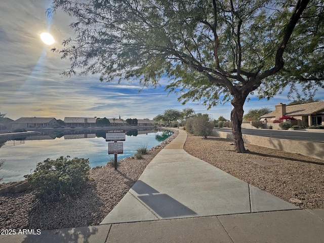 view of home's community featuring a water view