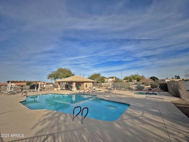 view of pool featuring a patio area