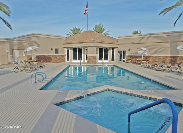 view of swimming pool featuring a patio