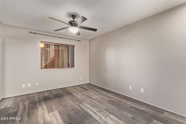 spare room featuring ceiling fan, wood-type flooring, and a textured ceiling