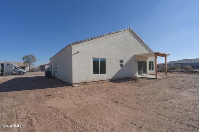 back of property with a patio area