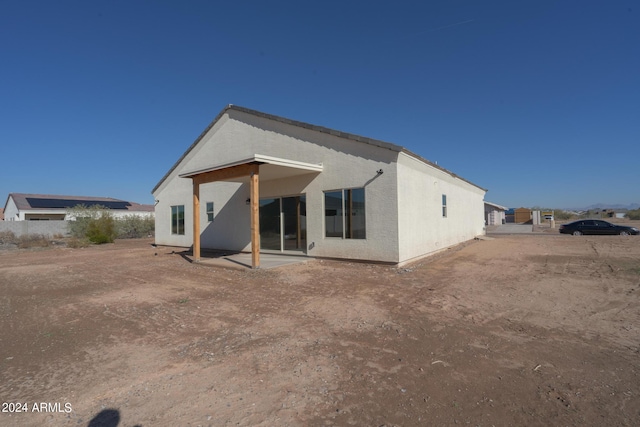 rear view of property with a patio area