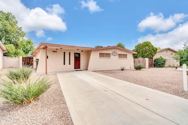 3124 W Port Royale Ln, Phoenix, AZ 85053 - view of front of property featuring stucco siding and driveway