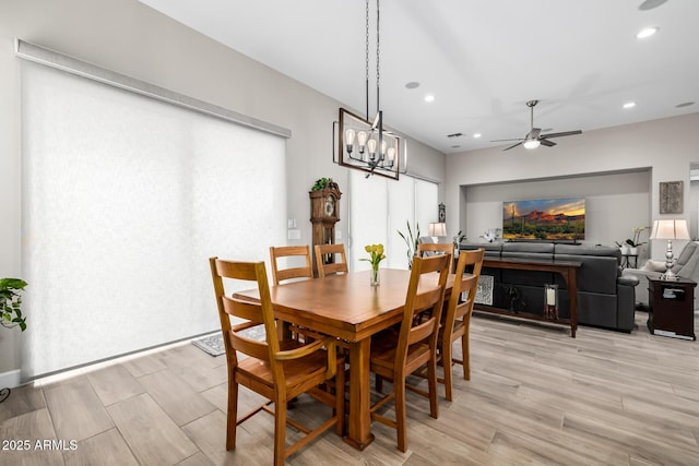 dining space with light wood-style flooring, ceiling fan, and recessed lighting