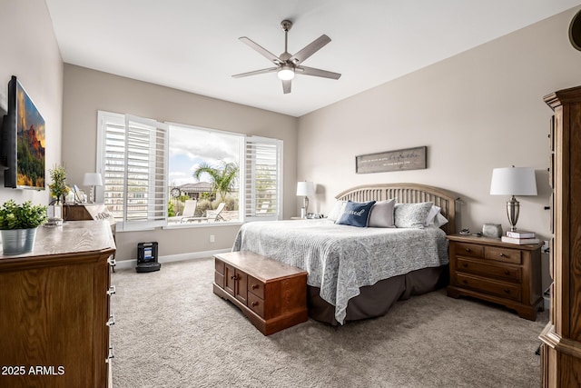 bedroom featuring carpet, ceiling fan, and baseboards