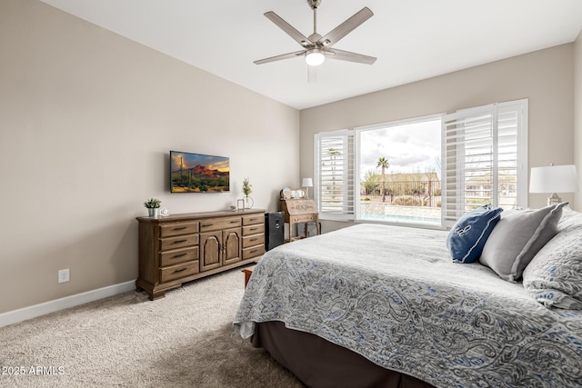 bedroom featuring ceiling fan, baseboards, vaulted ceiling, and light colored carpet