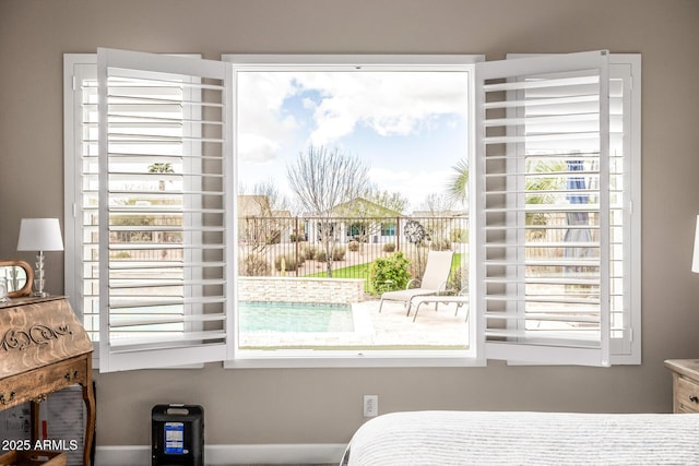 bedroom featuring multiple windows