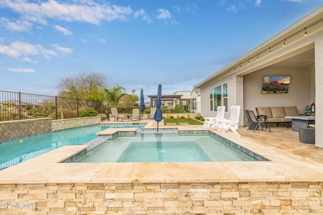 view of pool featuring an outdoor hangout area, a patio area, fence, and a pool with connected hot tub