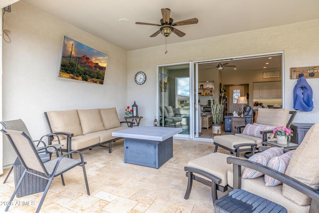 view of patio / terrace with an outdoor hangout area and a ceiling fan