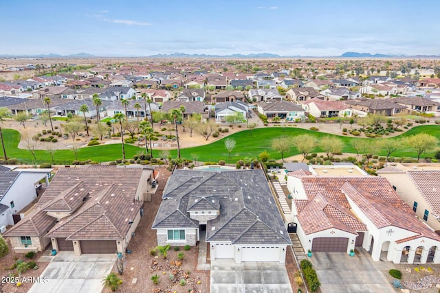 aerial view with a residential view and golf course view