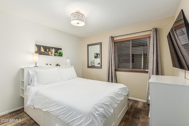 2108 E Patrick Ln, Phoenix, AZ 85024 - bedroom featuring dark wood finished floors