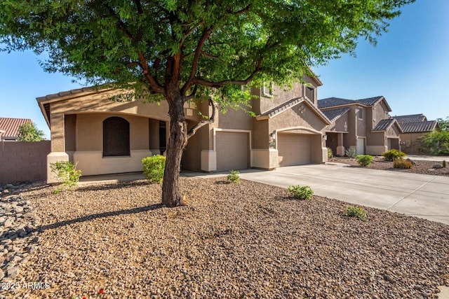 46065 W Meadows Ln, Maricopa, AZ 85139 - view of front of house featuring stucco siding, a garage, and concrete driveway