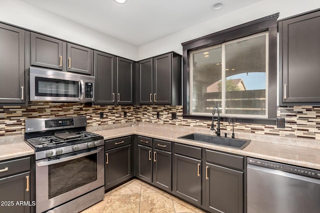 46065 W Meadows Ln, Maricopa, AZ 85139 - kitchen with appliances with stainless steel finishes, light countertops, decorative backsplash, and recessed lighting