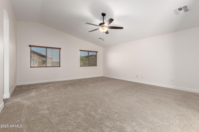 46065 W Meadows Ln, Maricopa, AZ 85139 - spare room with lofted ceiling, carpet, and a ceiling fan