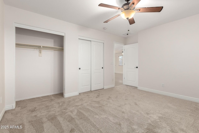46065 W Meadows Ln, Maricopa, AZ 85139 - unfurnished bedroom with multiple closets, carpet flooring, and ceiling fan