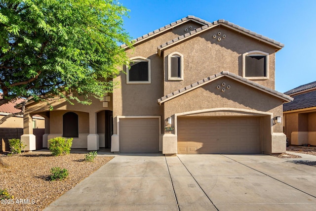 46065 W Meadows Ln, Maricopa, AZ 85139 - mediterranean / spanish home featuring stucco siding, driveway, and an attached garage