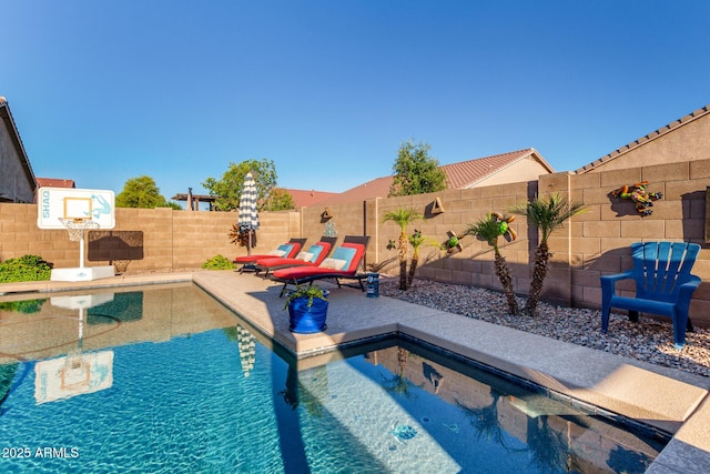 46065 W Meadows Ln, Maricopa, AZ 85139 - view of swimming pool with a fenced backyard and a patio