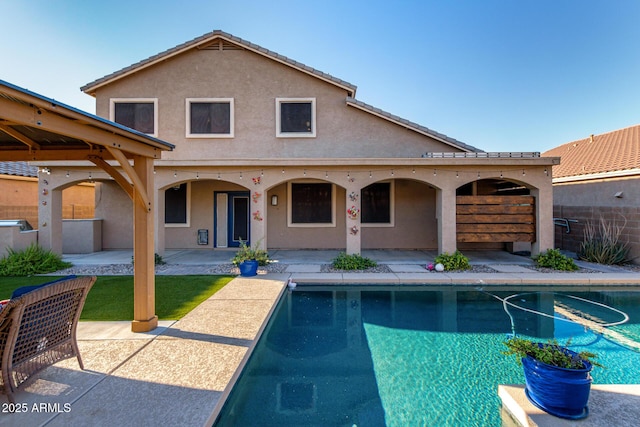46065 W Meadows Ln, Maricopa, AZ 85139 - rear view of house featuring a patio and stucco siding