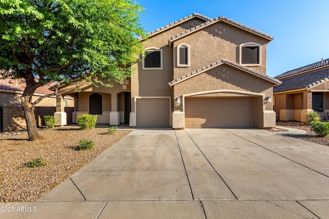 46065 W Meadows Ln, Maricopa, AZ 85139 - mediterranean / spanish-style house featuring stucco siding, concrete driveway, an attached garage, and a tile roof