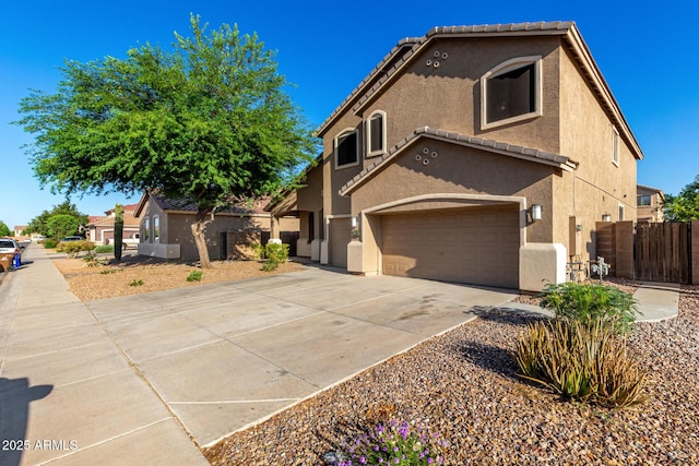 46065 W Meadows Ln, Maricopa, AZ 85139 - view of front of home with stucco siding, a garage, driveway, and a tile roof