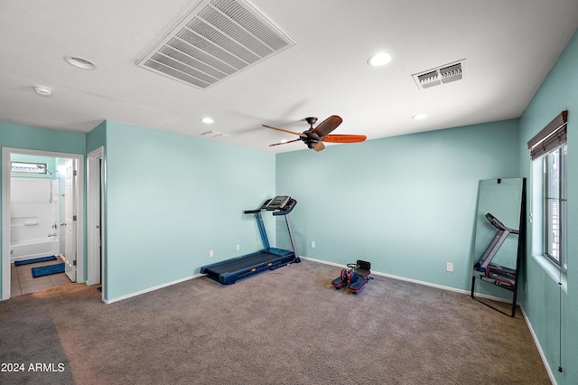 workout room featuring carpet, visible vents, and recessed lighting