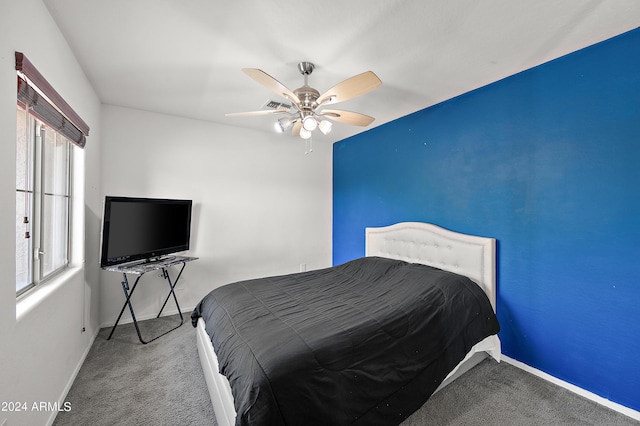 bedroom featuring carpet floors, ceiling fan, and baseboards