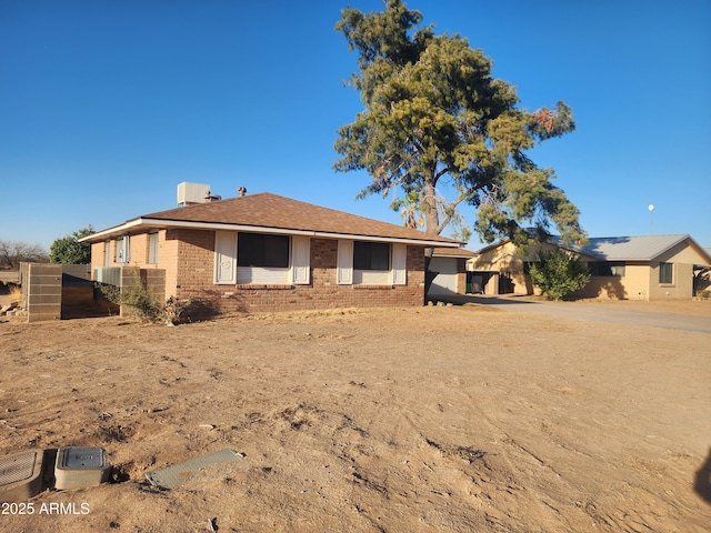 ranch-style home with brick siding