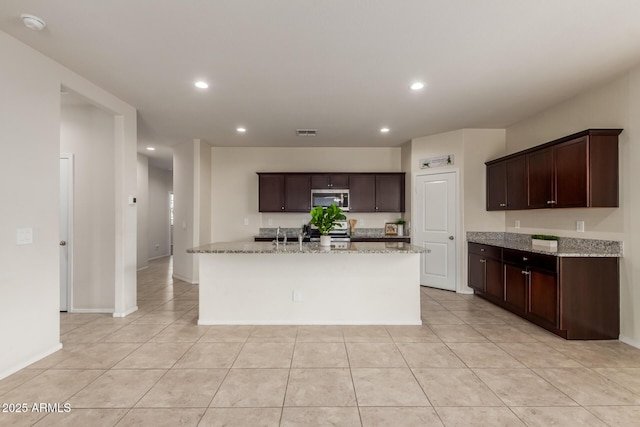 kitchen featuring light tile patterned flooring, visible vents, appliances with stainless steel finishes, and recessed lighting