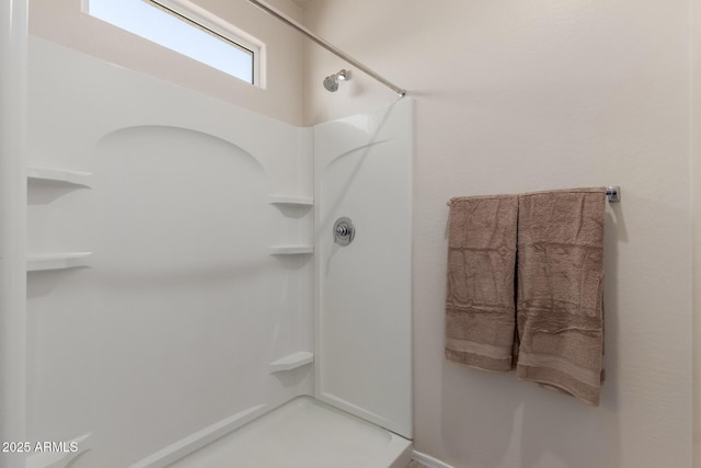 bathroom with walk in shower