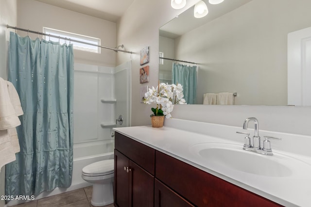 full bathroom featuring vanity, toilet, tile patterned flooring, and shower / bath combo