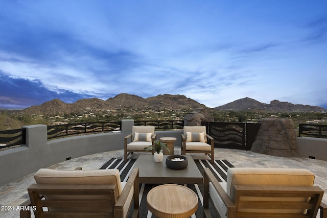 view of patio / terrace featuring a mountain view