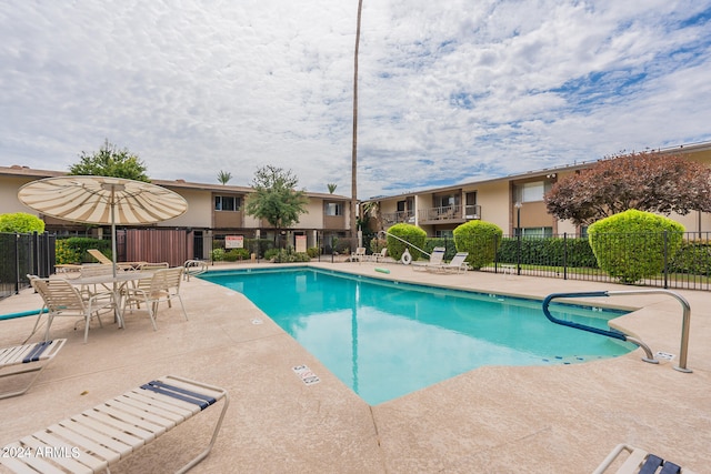 view of pool with a patio area