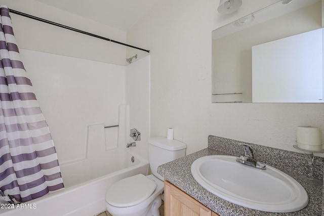 full bathroom featuring toilet, vanity, and shower / bath combo