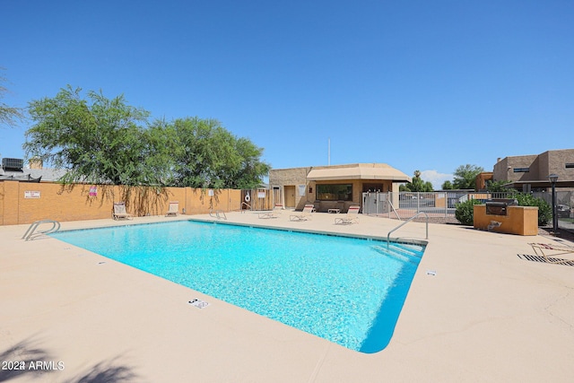 view of pool with a patio area