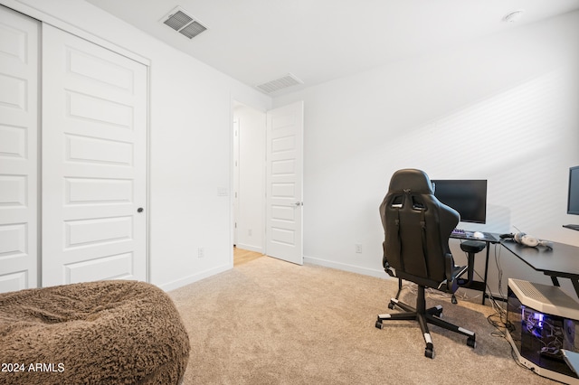 office featuring light carpet