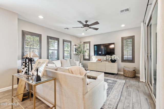 1941 W Yellowstone Way, Chandler, AZ 85248 - living area with ceiling fan, light wood finished floors, baseboards, and recessed lighting