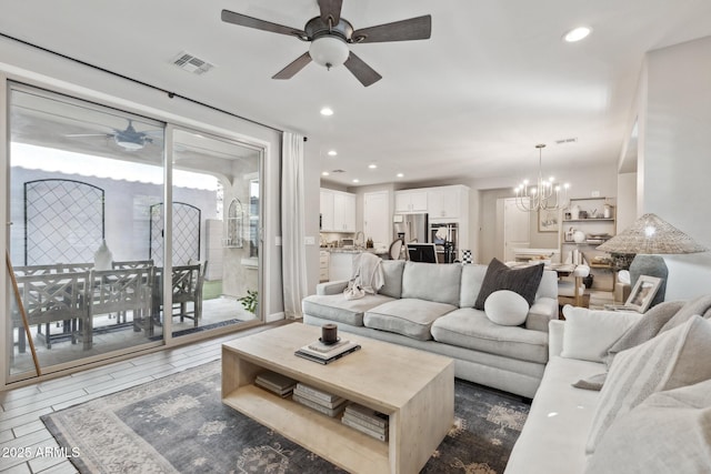 1941 W Yellowstone Way, Chandler, AZ 85248 - living room with a ceiling fan, a chandelier, and recessed lighting