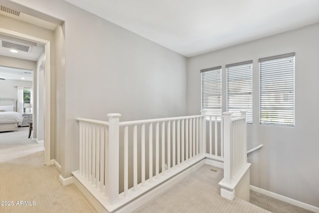 1941 W Yellowstone Way, Chandler, AZ 85248 - corridor featuring an upstairs landing, carpet floors, and baseboards