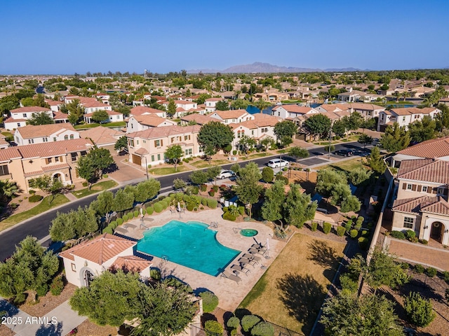 1941 W Yellowstone Way, Chandler, AZ 85248 - aerial perspective of suburban area with a pool area and a mountain backdrop