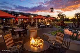 1941 W Yellowstone Way, Chandler, AZ 85248 - patio terrace at dusk featuring a fire pit