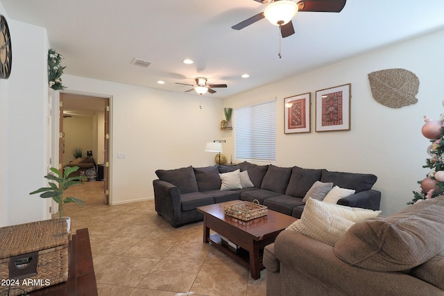 tiled living room featuring ceiling fan