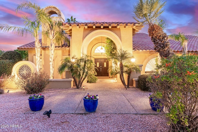 view of front of home with a patio