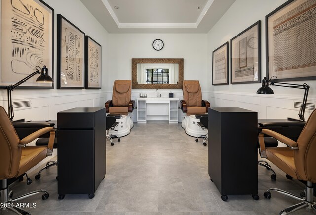 office area featuring a tray ceiling