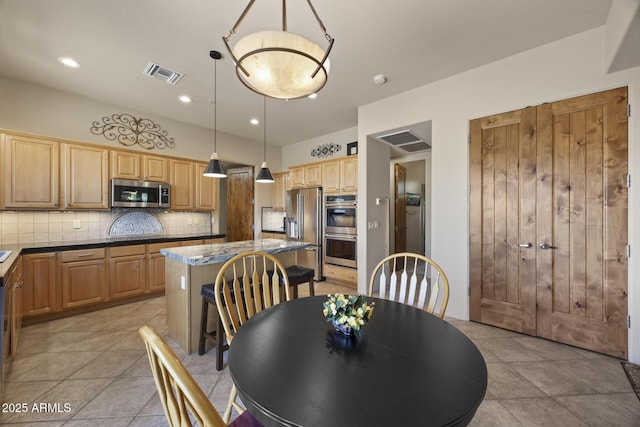14007 E Lupine Ave, Scottsdale, AZ 85259 - dining room featuring light tile patterned flooring and recessed lighting