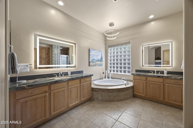 14007 E Lupine Ave, Scottsdale, AZ 85259 - bathroom with two vanities and a bath