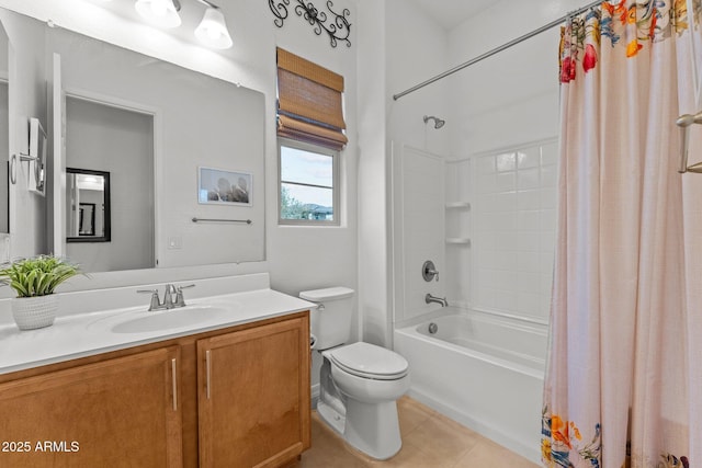 full bathroom featuring tile patterned floors, toilet, shower / bath combo with shower curtain, and vanity