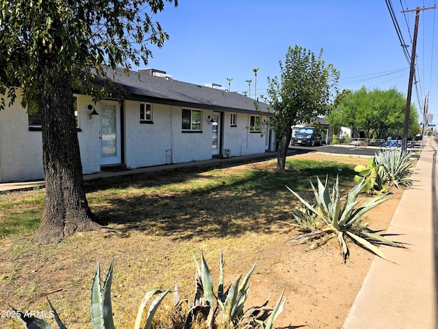 4450 N Longview Ave, Phoenix, AZ 85014 - view of front of home featuring stucco siding