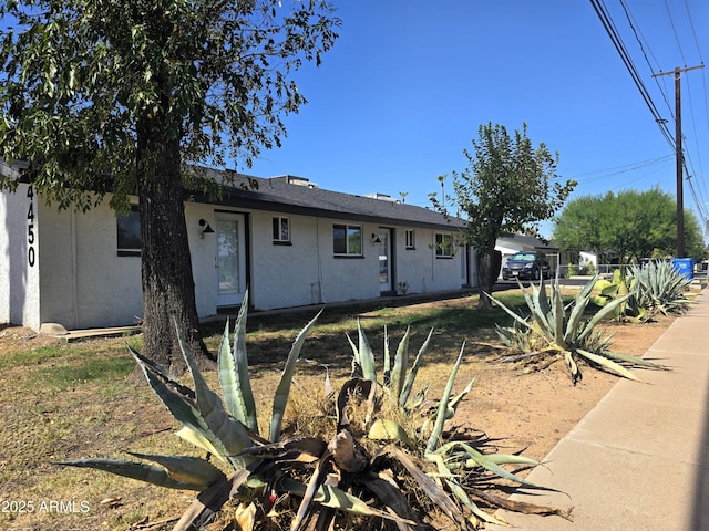 4450 N Longview Ave, Phoenix, AZ 85014 - view of front of home featuring stucco siding