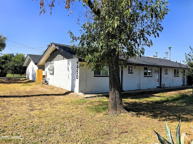 4450 N Longview Ave, Phoenix, AZ 85014 - view of front of property with stucco siding