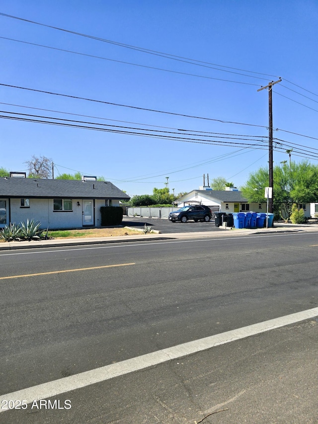 4450 N Longview Ave, Phoenix, AZ 85014 - view of asphalt road with curbs and sidewalks